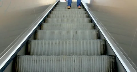 Shot of man with notebook moving on escalator Stock Footage 132452590