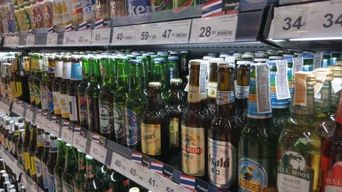 Shot of the man's Hand Taking beer from supermarket Video stock 122329498