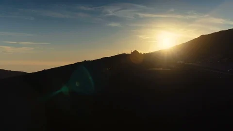 Shot of Mount Etna during Sunset with a nice lens flare Stock Footage 88594350
