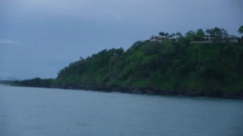 A shot of a mountain and ocean Stock Footage 78991839