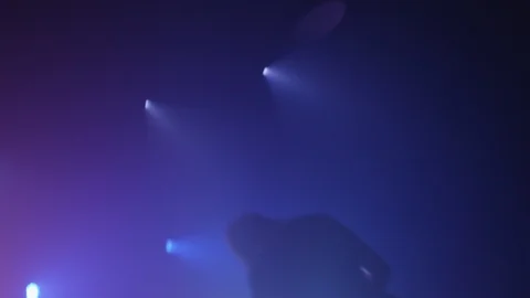 Shot moving between two musicians jamming on stage Stock Footage 127111040