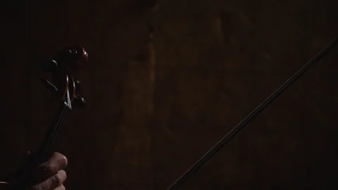 Shot moving down violin bow Stock Footage 127070238