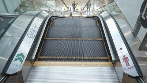 Shot of a moving downward escalator Stock Footage 125497822