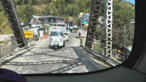 Shot of moving scenery seen through the windows of a vehicle at India Stock Footage 97996067