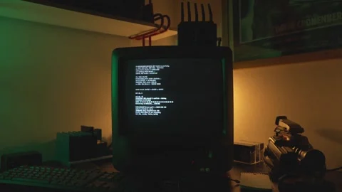 Shot of an old computer displaying programing text in monitor inside room Stock Footage 310924363