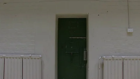 Shot of old jail door Vídeo Stock 84973697