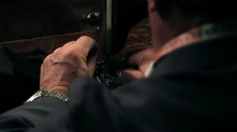 Shot of an old tailor in his workshop Stock Footage 27799814