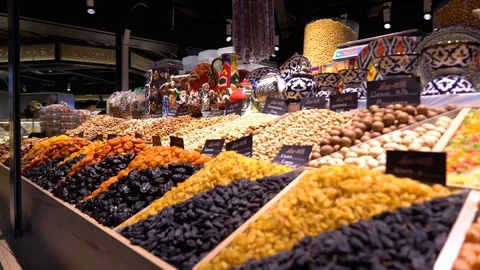 Shot over dry Fruit stand in a local market Video stock 108613813