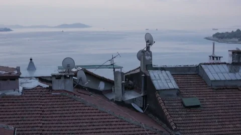 Shot over rooftops with Istanbul Harbor Basin in Background Stock Footage 75212975