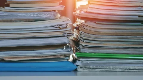 A shot of paper documents and magazines on a table Stock Footage 169228892