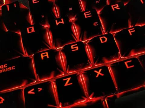  A shot of a PC keyboard with implied hacking activity, symbolizing cybers... Stock-Fotos