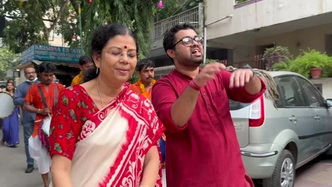 A Shot of People Dancing in Durga Puja Street Procession Festival Delhi India Stock Footage 332119428