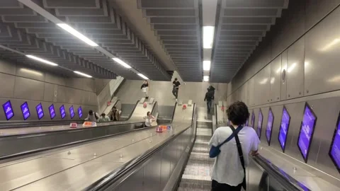 A Shot of People Using Escalators at Tottenham Court Road Underground Station Stock-Footage 307837776