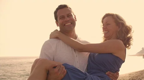 Shot of playing couple on beach. Stock Footage 43656240