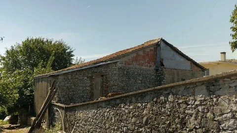 Shot of a poor buildning in Shkodër, Albania, roof wide Stock Footage 84683526