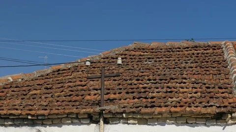 Shot of a poor buildning in Shkodër, Albania, roof brick close Stock Footage 84683593