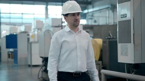 Shot of Professional Factory Worker Wearing Hard Hat Holds Tablet Computer Stock Footage 172014553