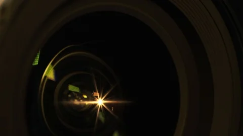 Shot of a professional video camera while it's lens is zooming Stock Footage 91696816