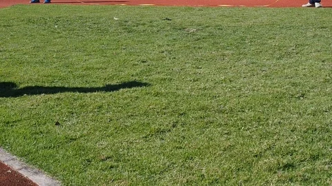 Shot put ball was thrown on the field by a athlete in the sport stadium. Stock Footage 101836026