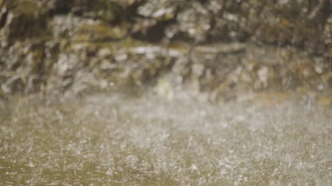 Shot of rain falling on water. Stock Footage 304576113