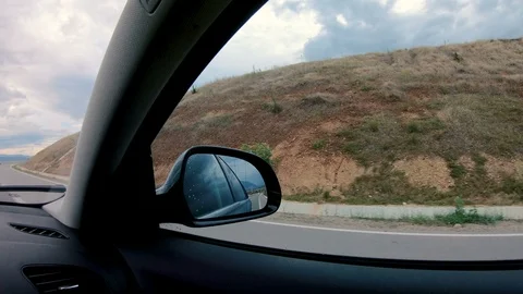 Shot of the rear view mirror while driving fast on the highway Stock Footage 91704572
