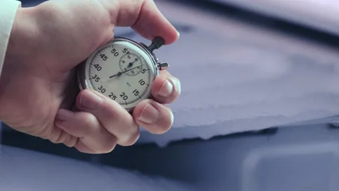 A shot of refrigerator defrosting process and stopwatch in a hand 库存影片 235155786