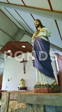 Shot of religious christian or catholic chapel and altar for worshippers Stock Photos