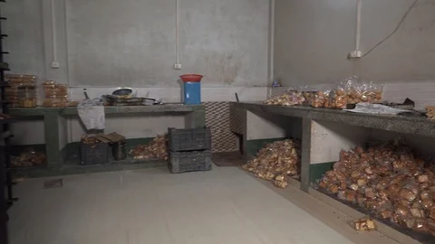 Shot of a room full of packed and labeled bread.Production ready for eating Stock Footage 112949428
