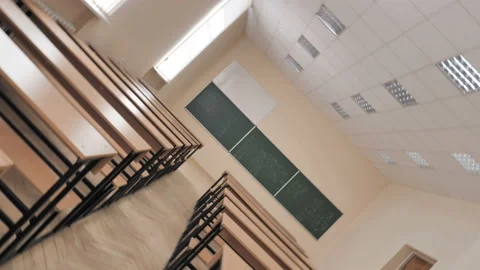 Shot In Rotation Of Empty College Classroom University Lecture Hall Stock Footage 138743957