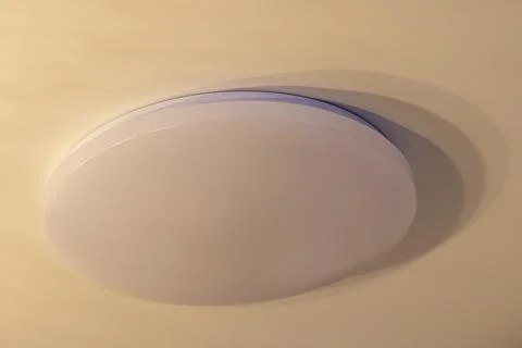 Shot of the round ceiling LED light. Objects Stock Photos