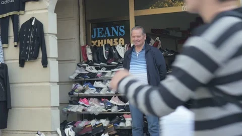 Shot in Shkodër in Albania, man at his store Video stock 137138126