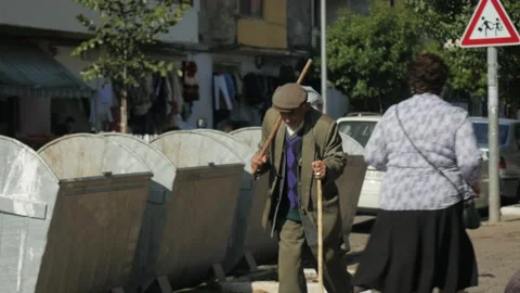 Shot in Shkodër in Albania, old man walking Stock Footage 137137422