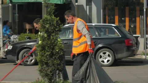 Shot in Shkodër in Albania, people working at the road Stock Footage 137138463