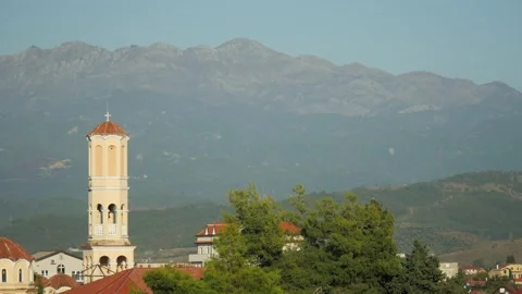 Shot in Shkodër in Albania, rooftop with mountains in the background Video stock 137132422