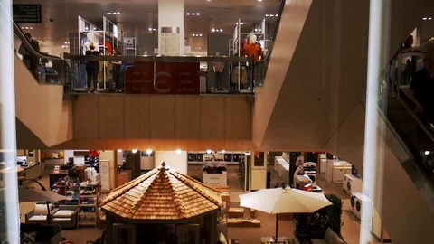 Shot of a shopping mall from a moving elevator Stock Footage 112729638