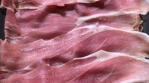 Shot on slices of parma ham. Stock Footage 333588930