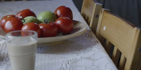 A shot of some tomatoes, apples and a pumpkin Stock Footage 119098779