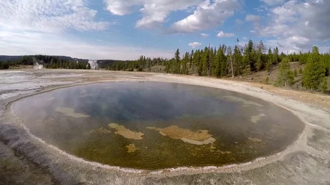 Shot of Steam Rolling over Geyser Pool Stock Footage 79596267