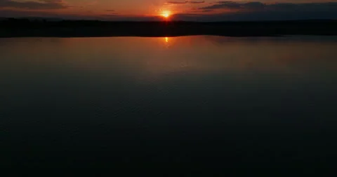 Shot of a Sunset Over a Lake Stock Footage 274915004