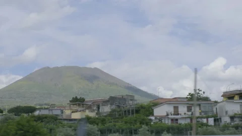 Shot through car window driving by Vesuvius Volcano Stock Footage 169470516