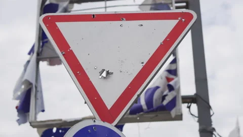A shot through road sign in Bucha, Ukraine Stock Footage 188331379