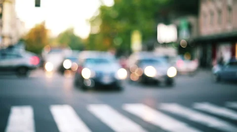 Shot of traffic context with biker riding into the traffic in blurred Stock-Footage 57208859