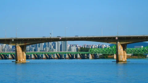 Shot of trains moving through the bridge across Han River in Seoul, South Korea Stock Footage 125596512