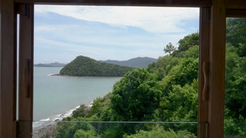 Shot of Trees and Ocean Through Window 4k Stock Footage 235868822