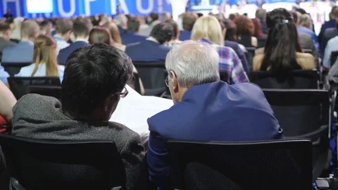 Shot of two smiling businessmen using a digital tablet. two businessmen look at Stock Footage 81670427