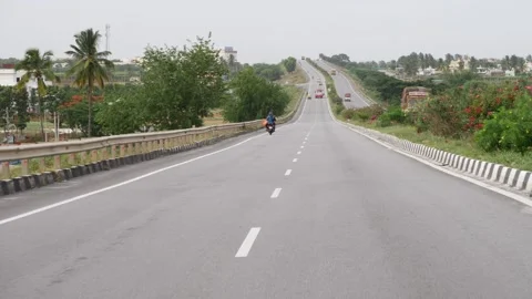 Shot of vehicles going down from slope of bridge Stock-Footage 156973252