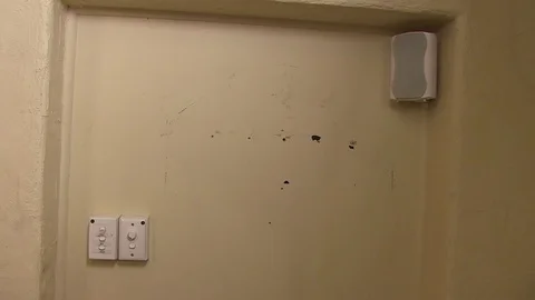 A shot of a wall with switch Stock Footage 84960732