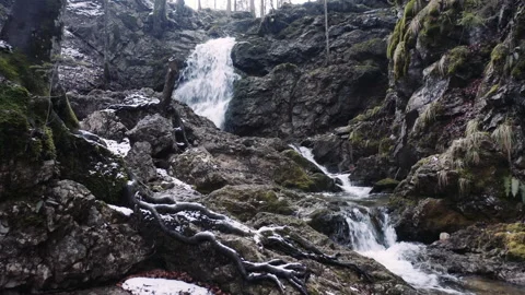 Shot of waterfall in forest with rocks and trees Stock Footage 150146442