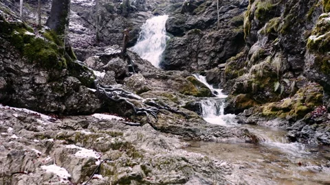 Shot of waterfall in forest with rocks and trees Stock Footage 150339835