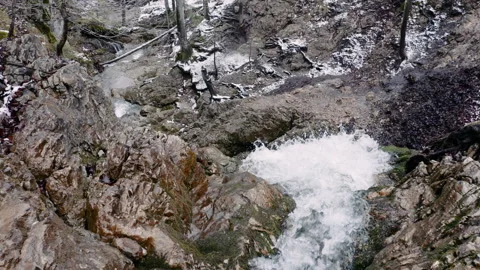 Shot of waterfall in forest with rocks and trees Stock Footage 150341309
